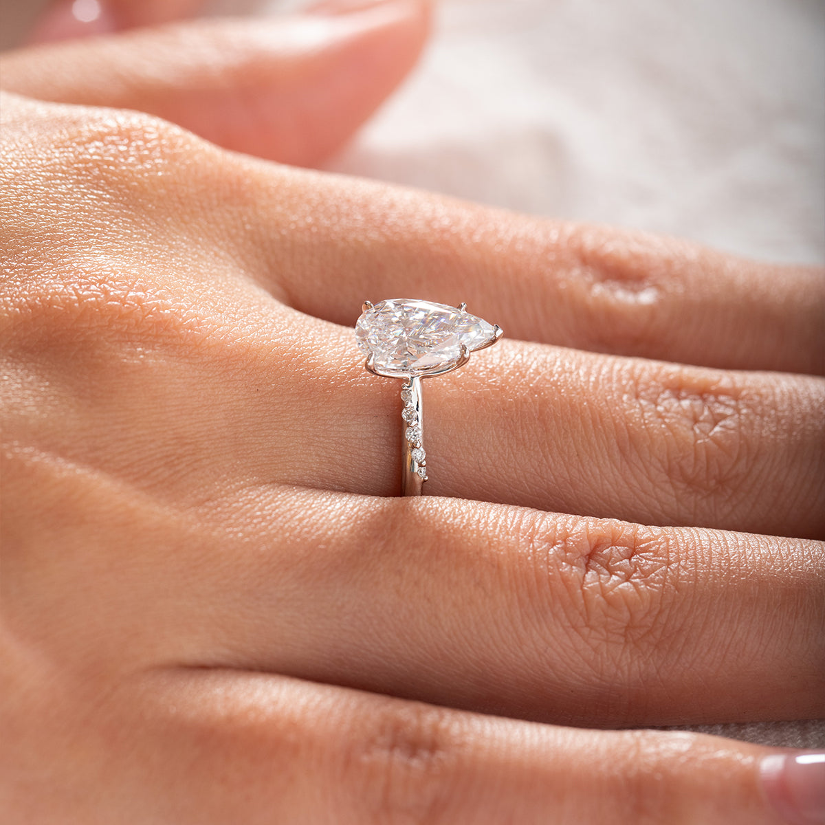 14K White Gold 2ct Pear Cut Lab Diamond Ring with Twist Pave Band and Floral Basket Head Design