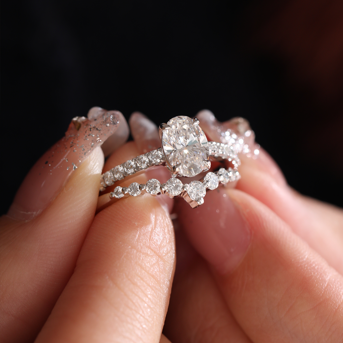 Platinum 1ct Oval Cut Lab Diamond 4 Claw Prong Basket Setting Round Lab Diamond Pave Ring with A 7-stone Round Lab Diamond V-Shaped Ring Enhancer - Bridal Ring Set Design
