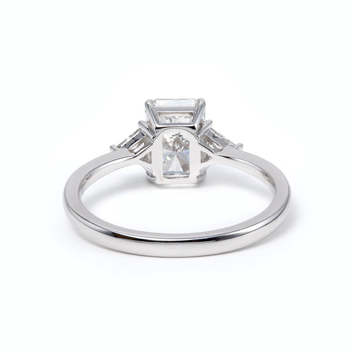 14K White Gold 1.5ct Radiant Cut Lab Diamond Three Stone Ring with Triangular Cut Lab Diamond Side Stones and Tapered Band Design