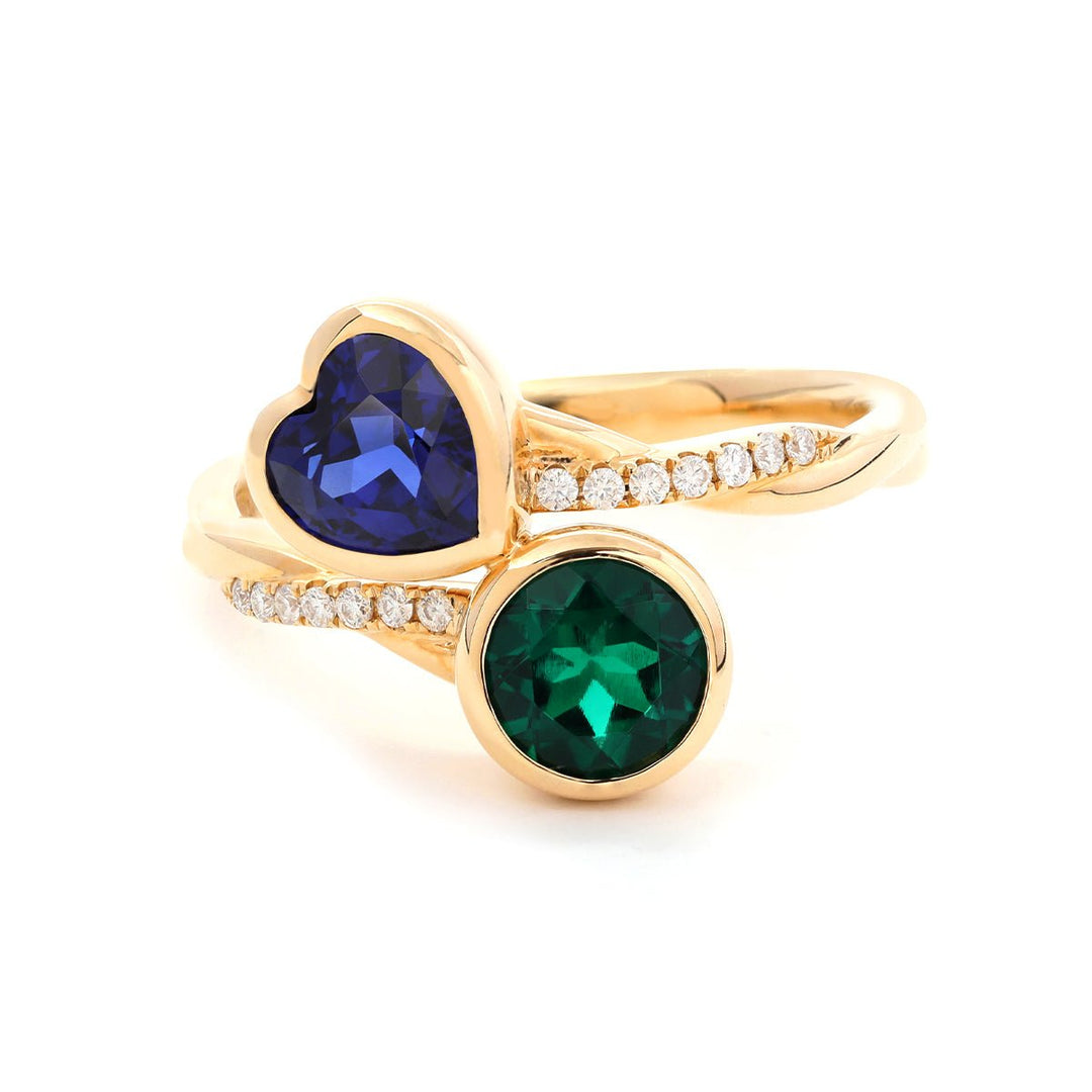 14K Yellow Gold Heart Lab Sapphire and Round Zambian Lab Emerald Toi et Moi Ring with Twist Band - FIORESE JEWELRY