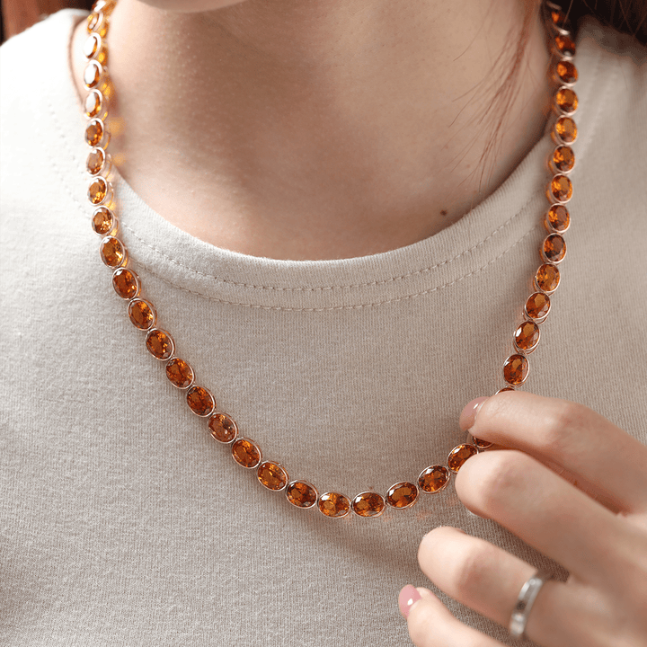 14K Yellow Gold Oval Lab Orange Sapphire Bezel Tennis Necklace with Adjustable Chain - FIORESE JEWELRY