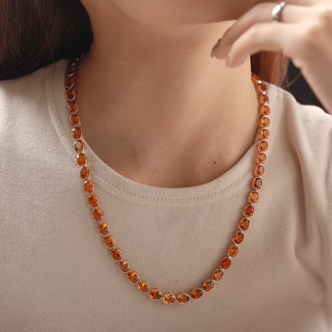 14K Yellow Gold Oval Lab Orange Sapphire Bezel Tennis Necklace with Adjustable Chain - FIORESE JEWELRY