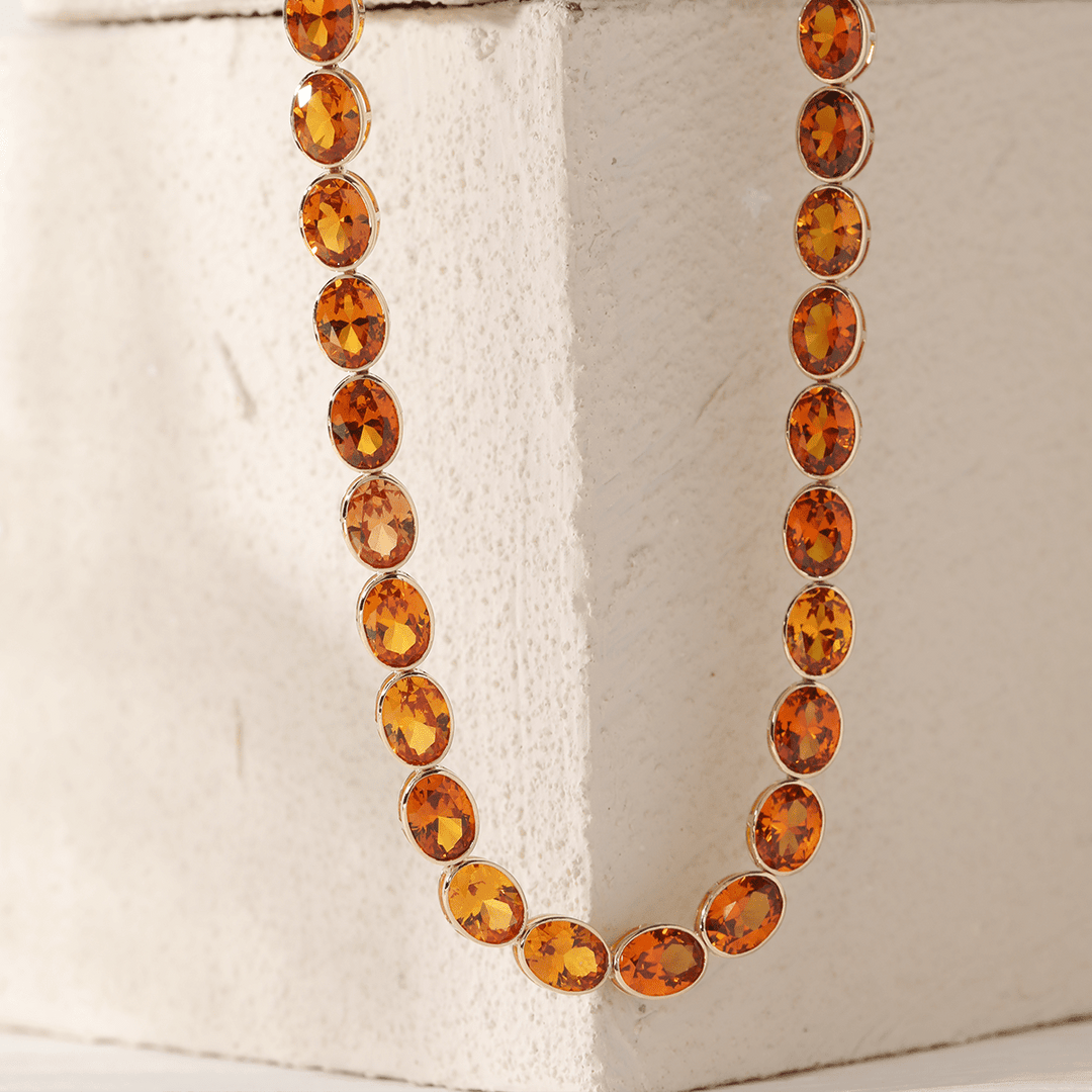 14K Yellow Gold Oval Lab Orange Sapphire Bezel Tennis Necklace with Adjustable Chain - FIORESE JEWELRY