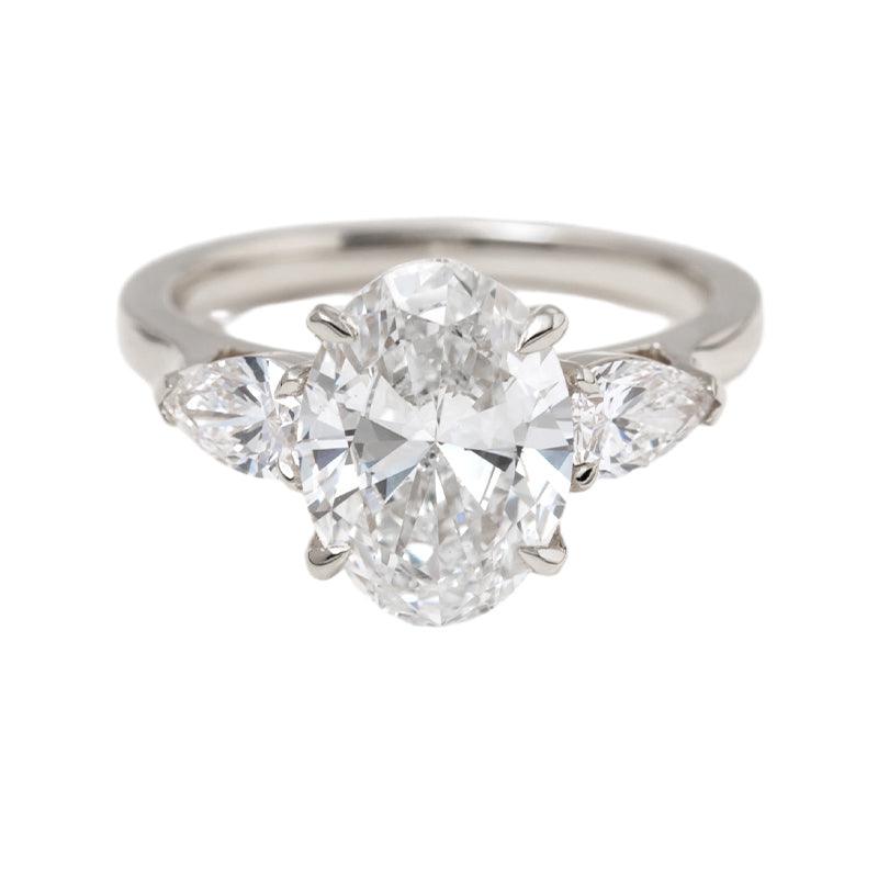 3 CT Oval Cut Lab Diamond 4 - Claw Floral Basket Three - Stone Ring with Pear Side Stones - FIORESE JEWELRY