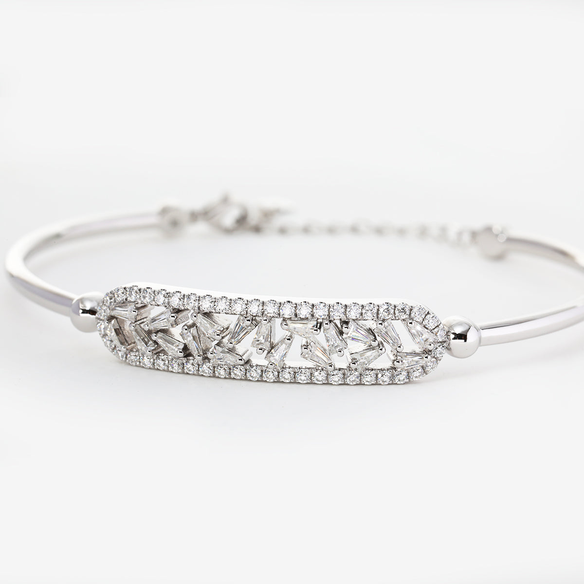 14K White Gold Cuff Bangle Bracelet with Tapered Baguette Cut and Round Cut Diamonds