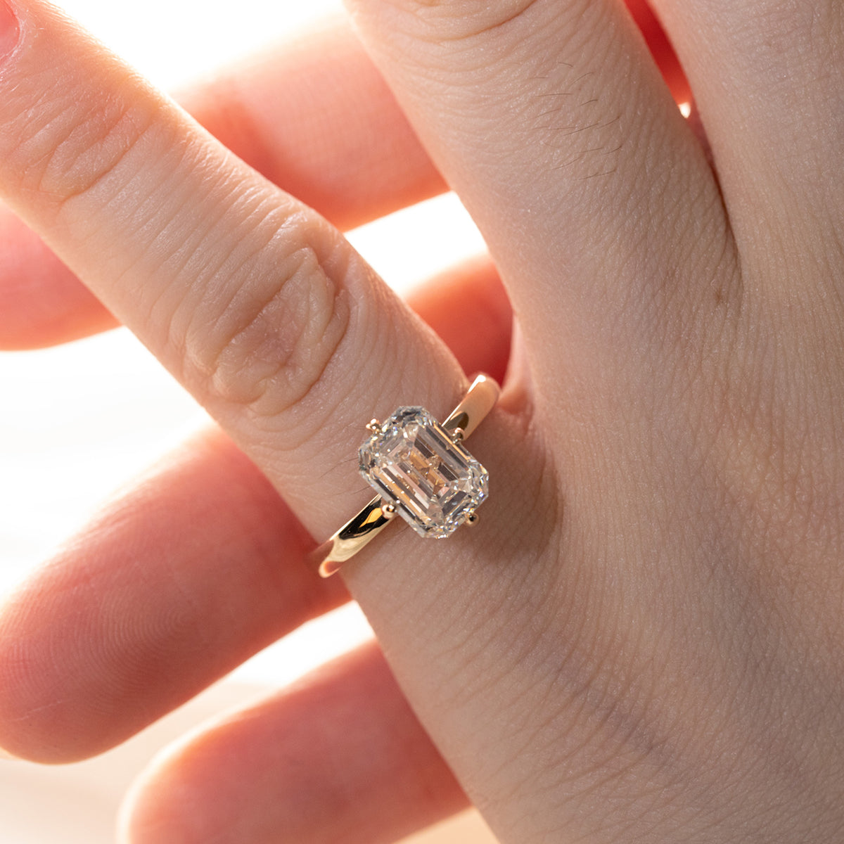 14K Yellow Gold 2 Carat Solitaire Diamond Ring with Emerald Cut Lab Diamond and Floral Prong Setting