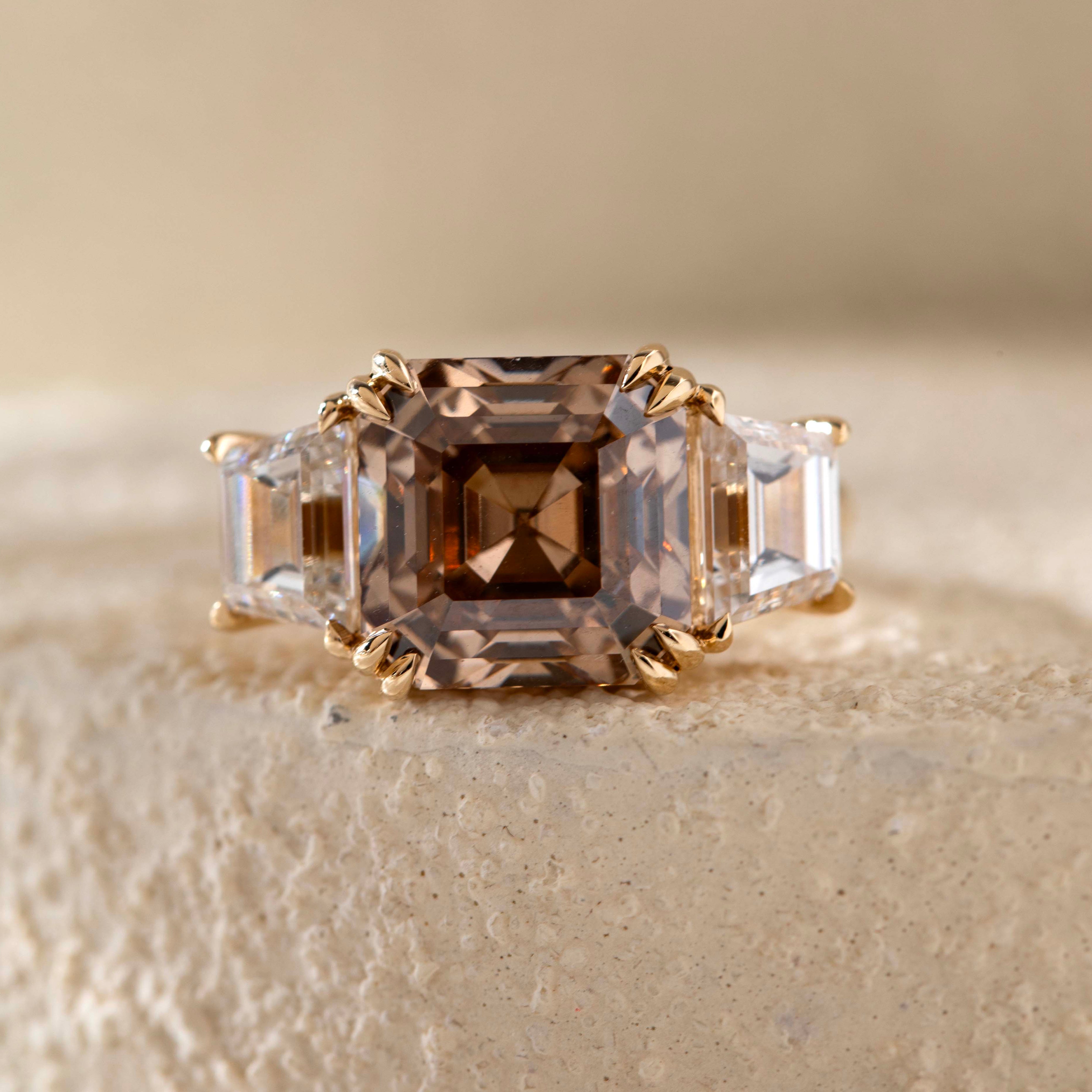 14K Yellow Gold 7ct Asscher Cut Brown Lab Diamond Double Claw Prongs Three-stone Ring with Two Trapezoid Step Cut Diamonds