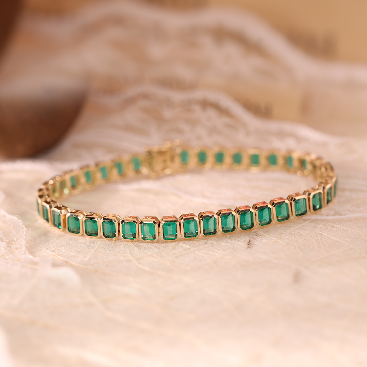 14K Yellow Gold Emerald Cut Lab Zambian Emerald Bezel Tennis Bracelet