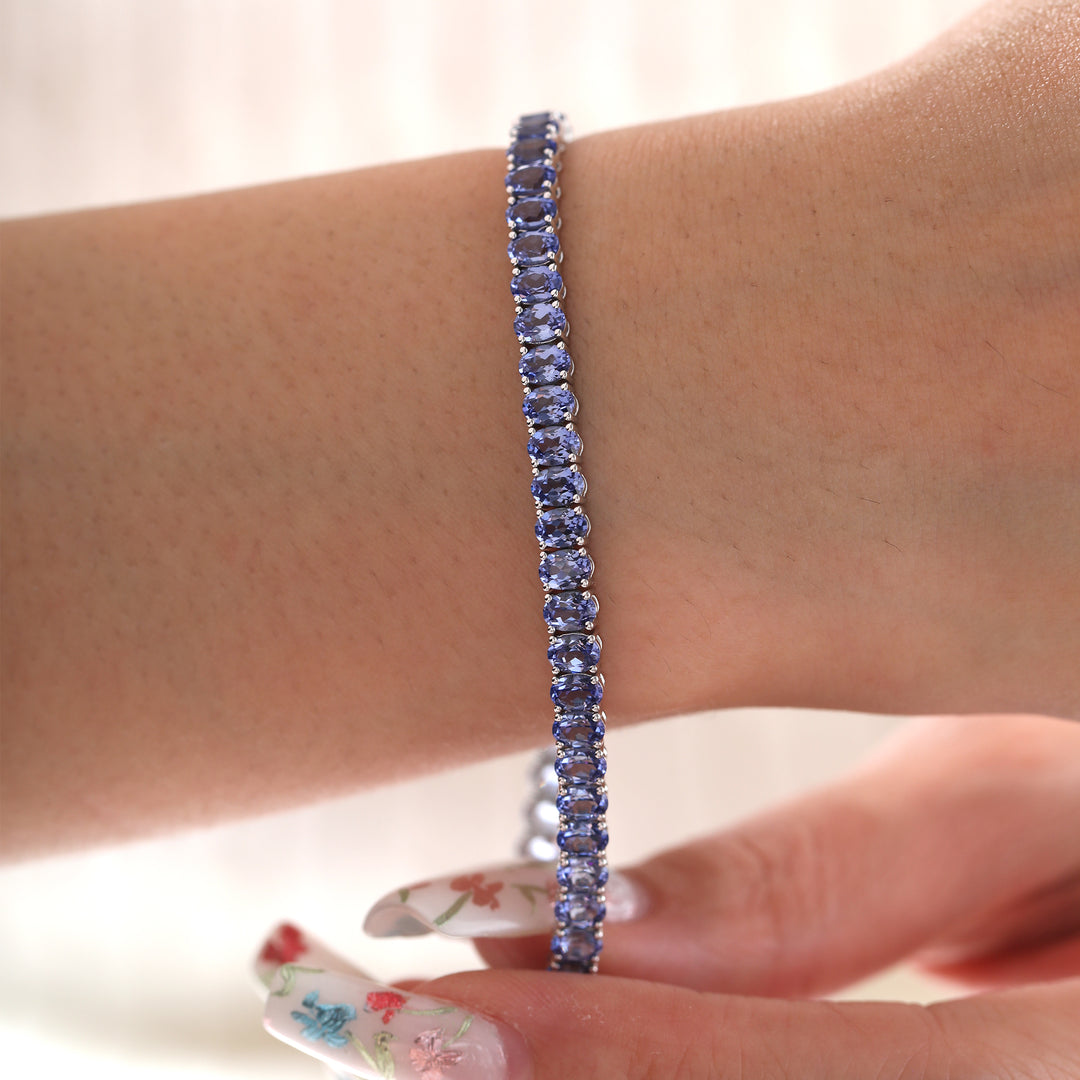 Oval Cornflower Blue Lab Sapphire Tennis Bracelet with 4-Prong Basket