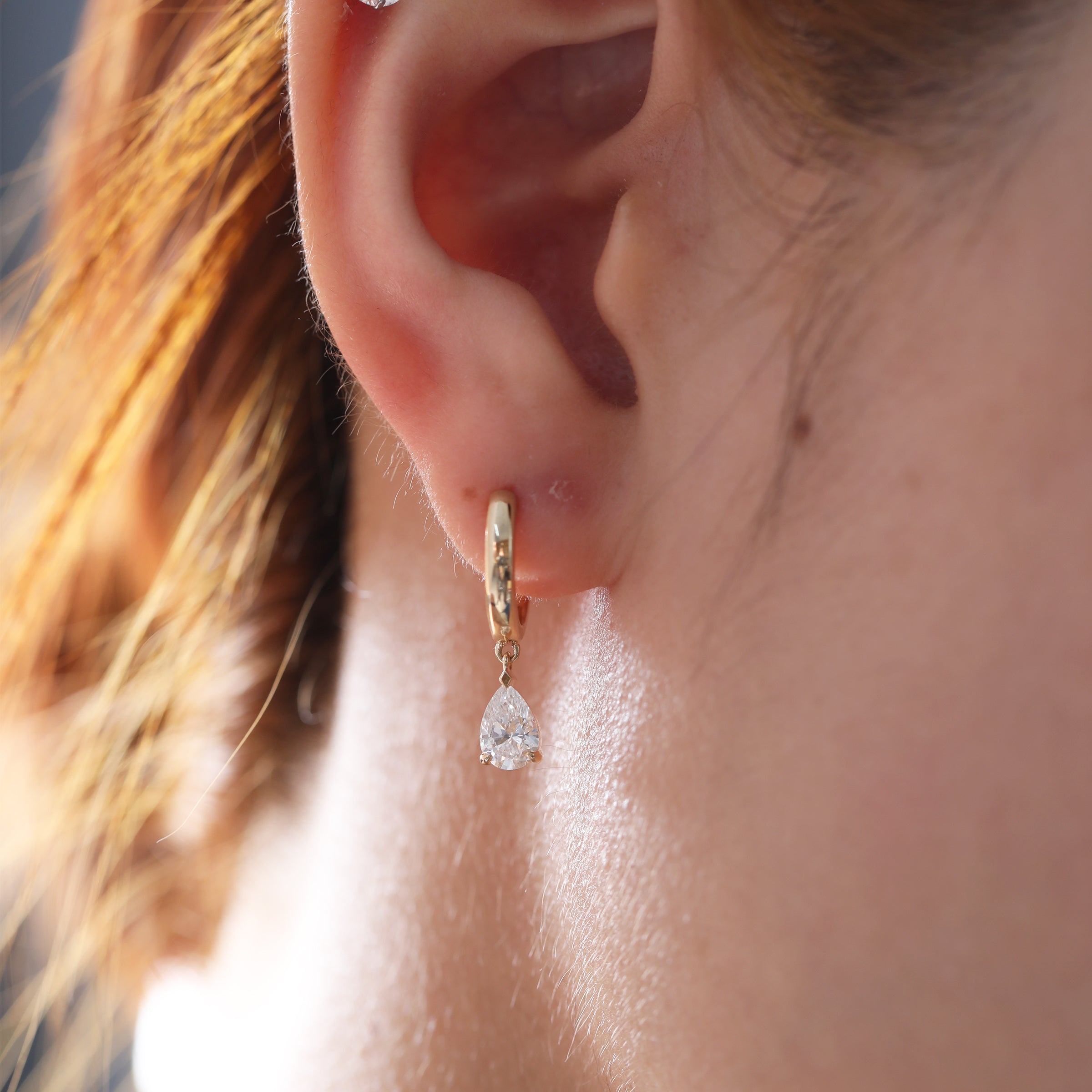 1 ct tw Pear Cut Diamond Three Prong Basket Hoop Earrings