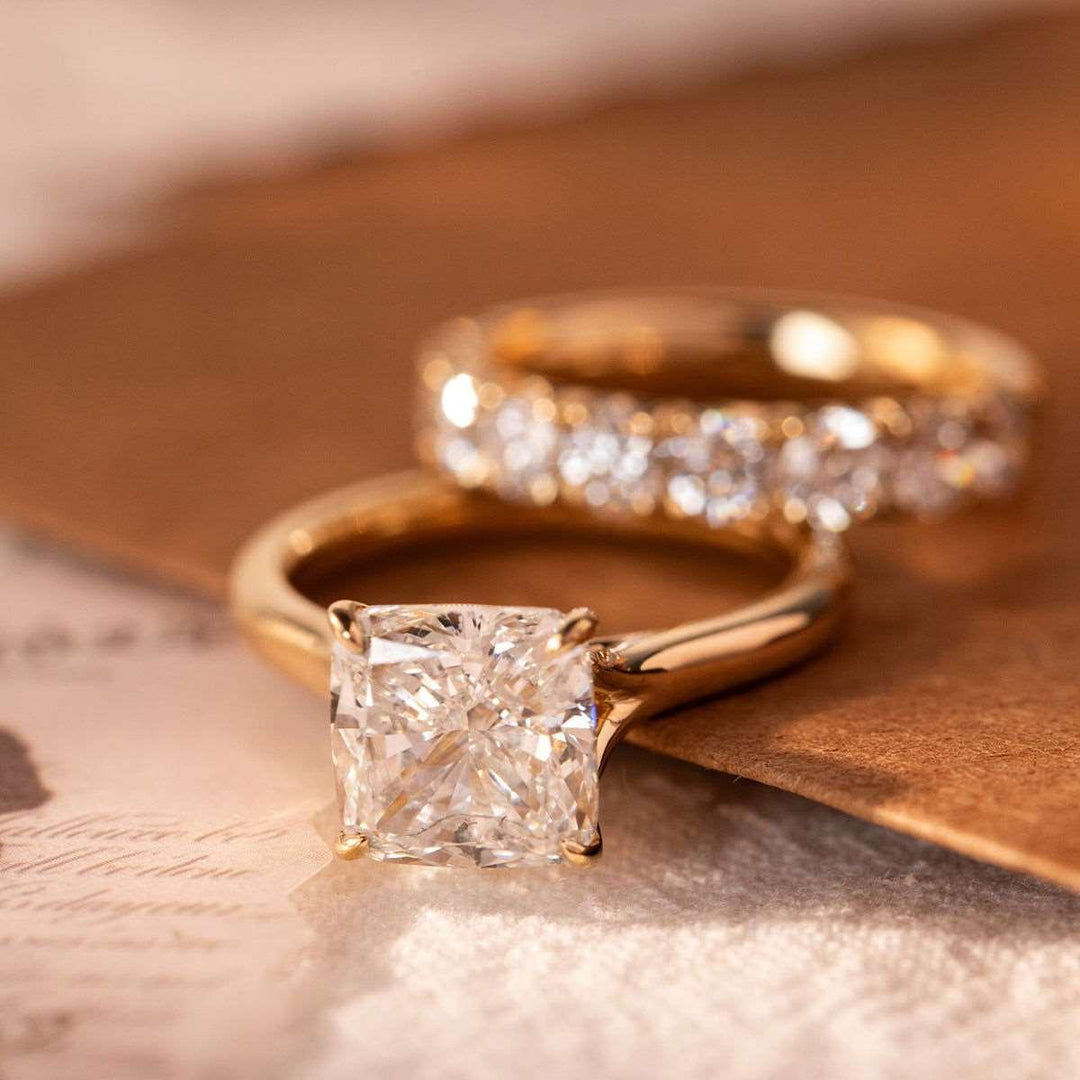 Cushion Cut Lab Diamond 4 - Claw Cathedral Bridal Set — Solitaire Engagement Ring with French Pavé Half Eternity Band - FIORESE JEWELRY