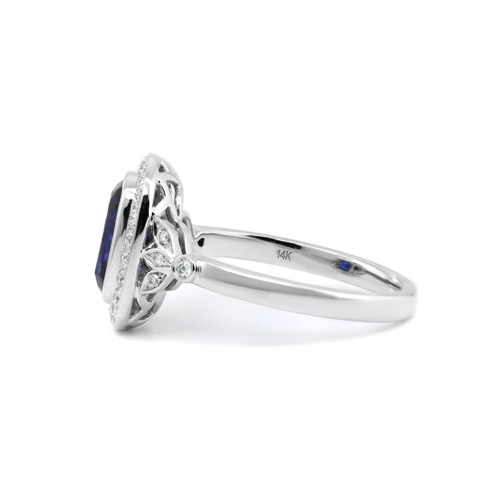 Elongated Cushion-Cut Royal Blue Lab Sapphire Halo Ring with Bezel Setting - FIORESE JEWELRY