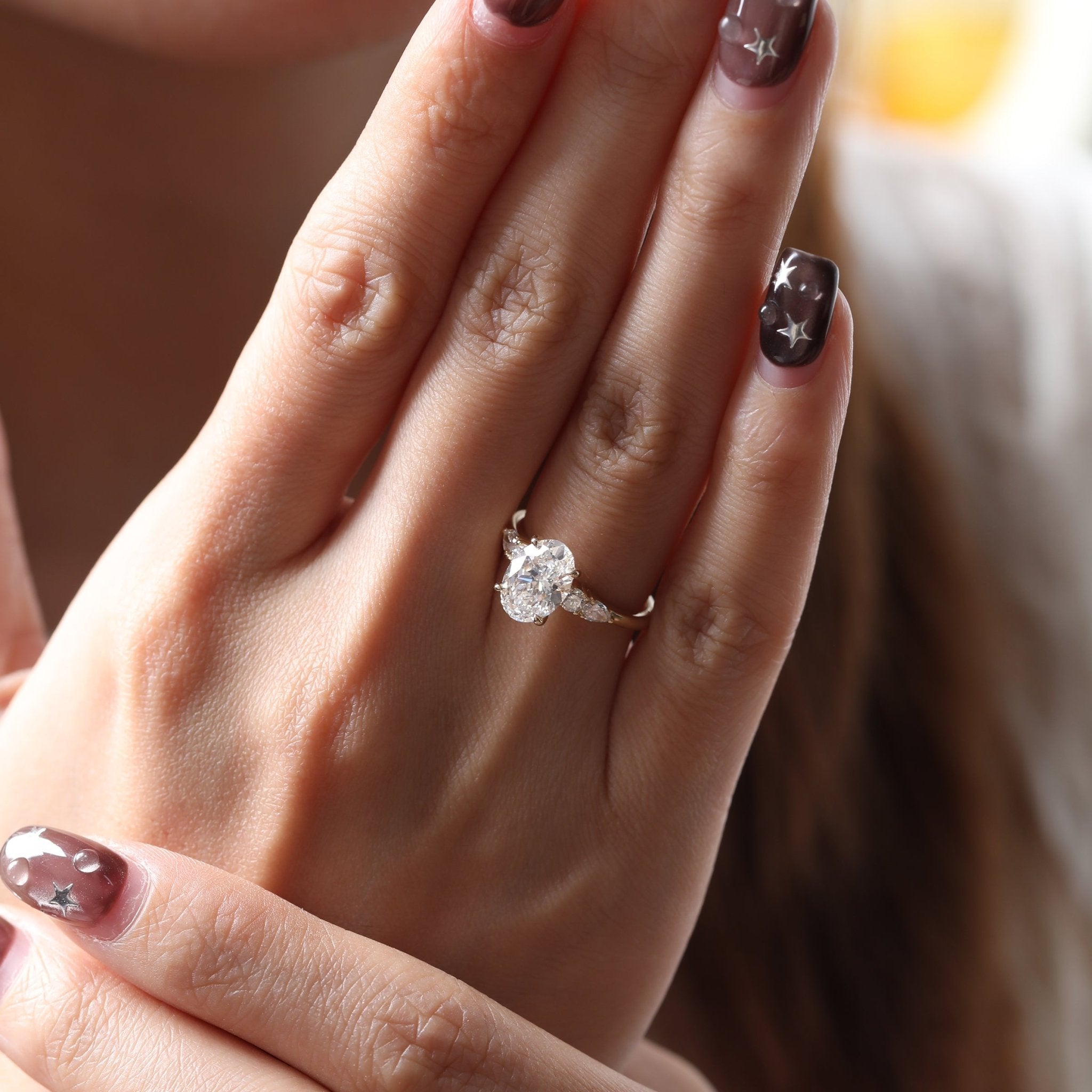 Oval Lab Diamond Ring with Four - Claw Prong Basket Setting and Round and Pear Lab Diamond Side Stones - FIORESE JEWELRY