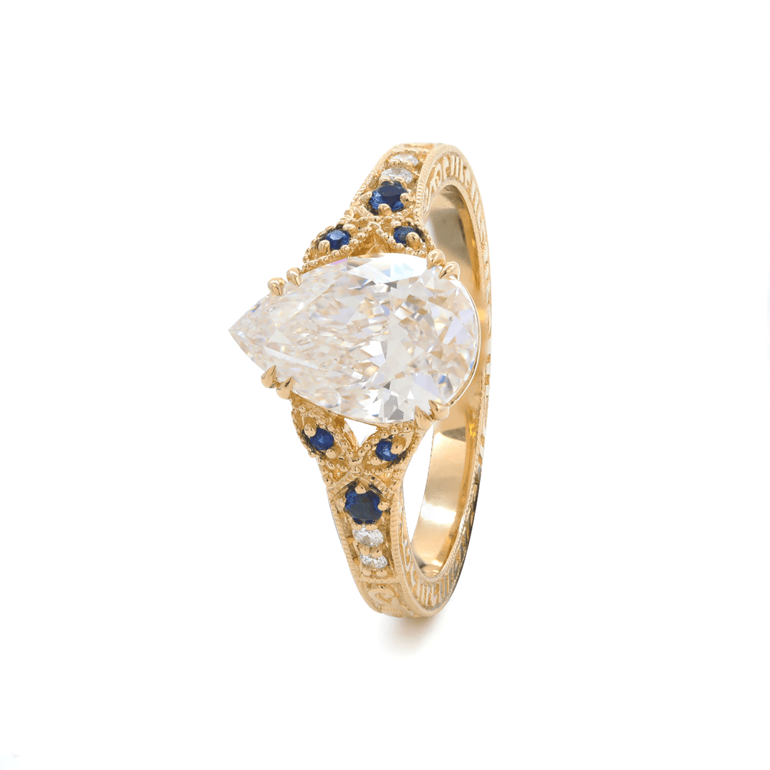Pear Lab Diamond Ring with Round Lab Diamond and Lab Sapphire Side Stones — Millegrain Floral Engraving, Art Nouveau Nature - Inspired - FIORESE JEWELRY