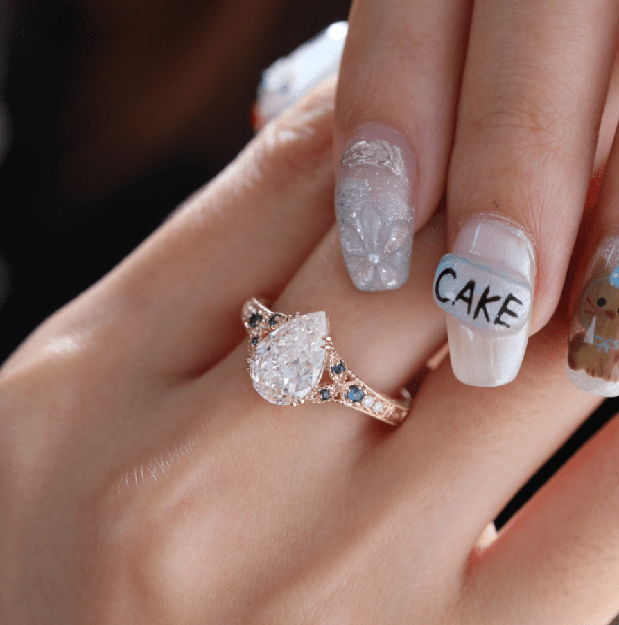 Pear Lab Diamond Ring with Round Lab Diamond and Lab Sapphire Side Stones — Millegrain Floral Engraving, Art Nouveau Nature - Inspired - FIORESE JEWELRY