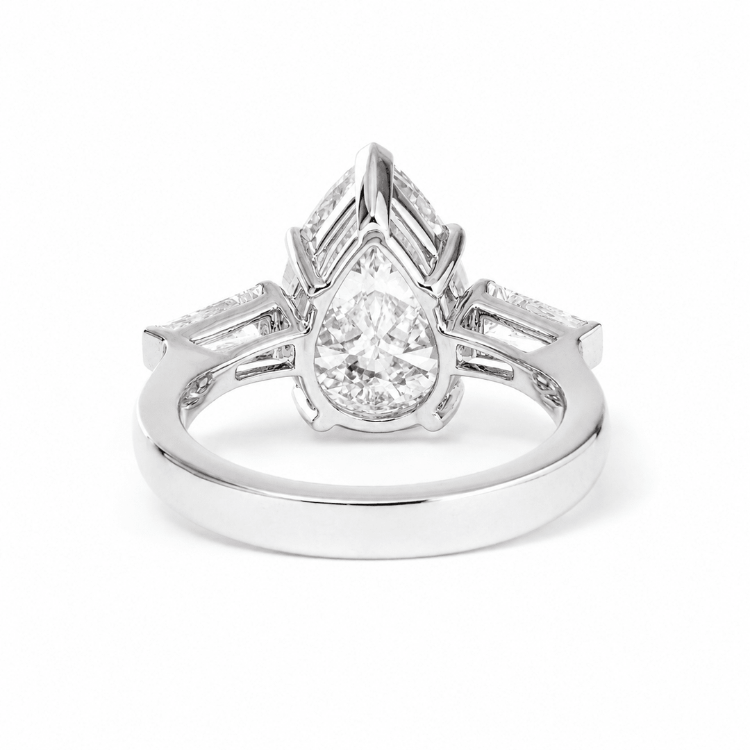 Pear Lab Diamond Three - Stone Ring with Tapered Baguette Side Stones - FIORESE JEWELRY