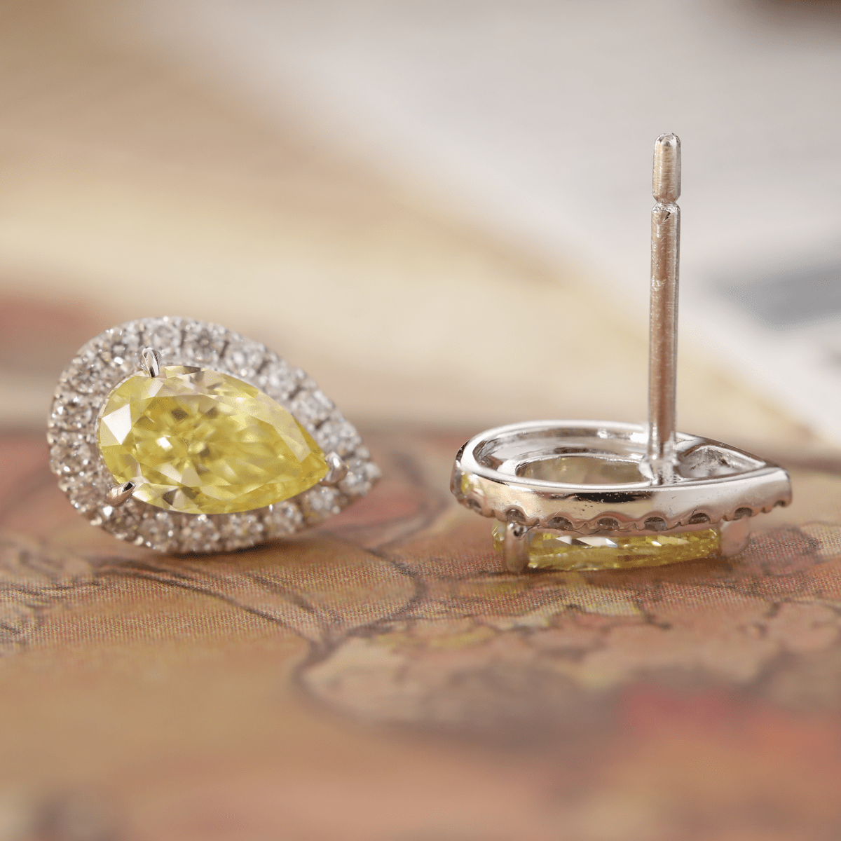 Platinum 1.5 ct tw Pear Shaped Fancy Yellow Lab Diamond Stud Earrings with Round Lab Diamond Halo