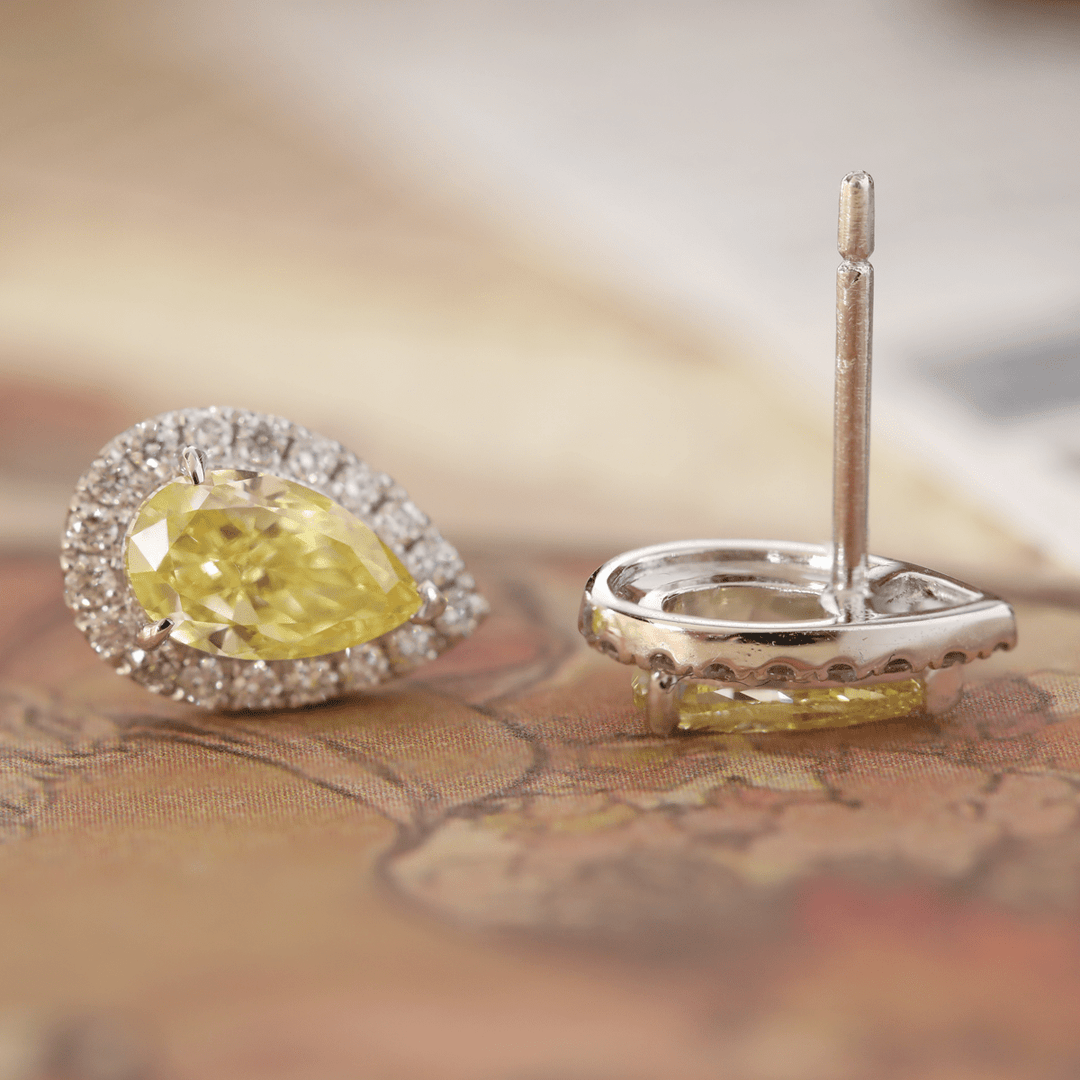 Platinum 1.5 ct tw Pear Shaped Fancy Yellow Lab Diamond Stud Earrings with Round Lab Diamond Halo - FIORESE JEWELRY