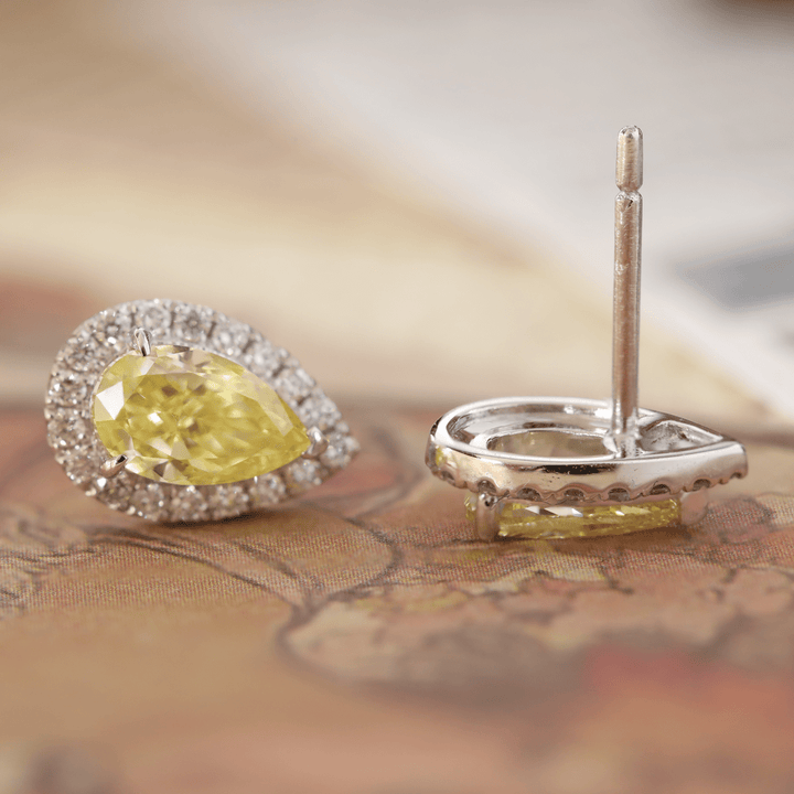 Platinum 1.5 ct tw Pear Shaped Fancy Yellow Lab Diamond Stud Earrings with Round Lab Diamond Halo - FIORESE JEWELRY