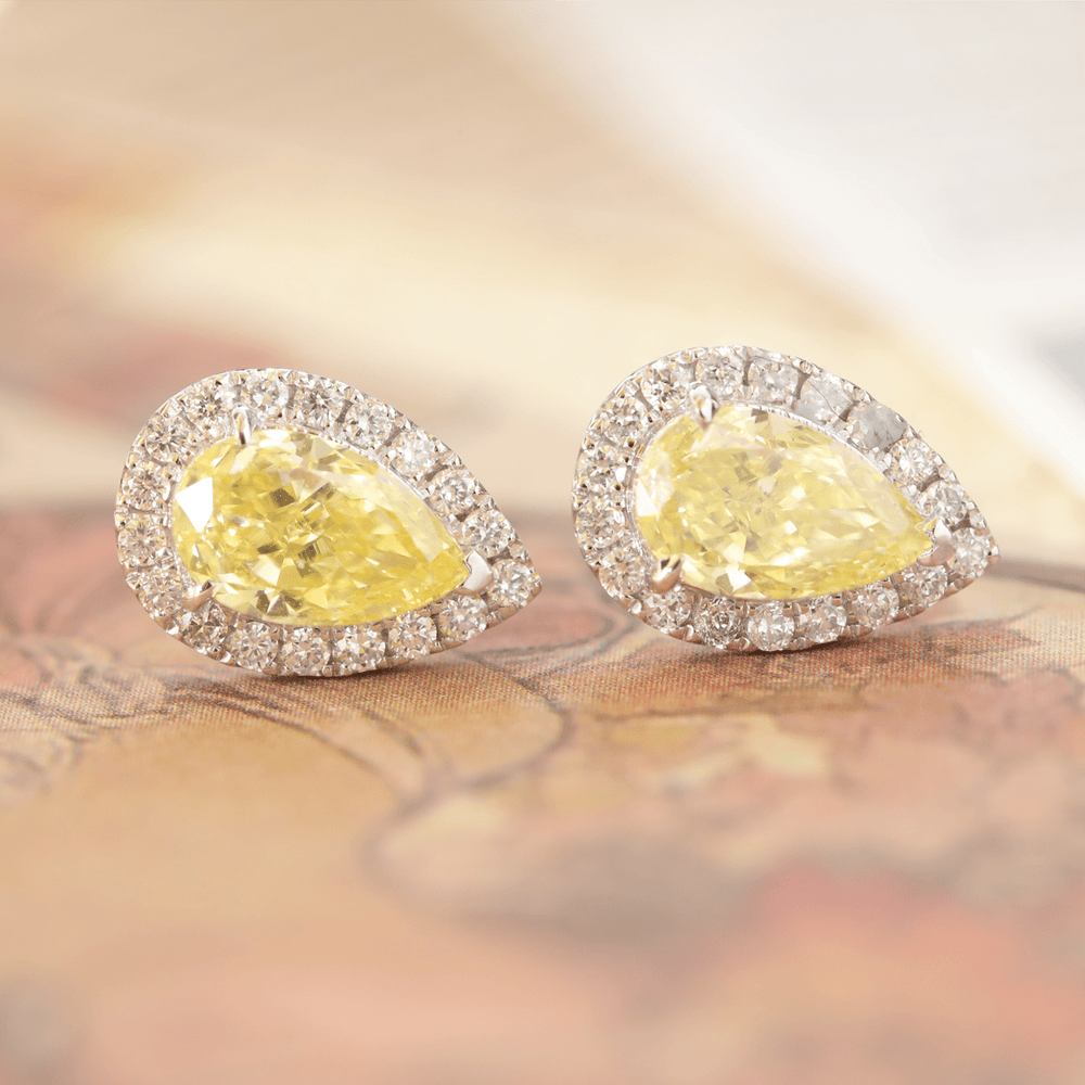 Platinum 1.5 ct tw Pear Shaped Fancy Yellow Lab Diamond Stud Earrings with Round Lab Diamond Halo - FIORESE JEWELRY