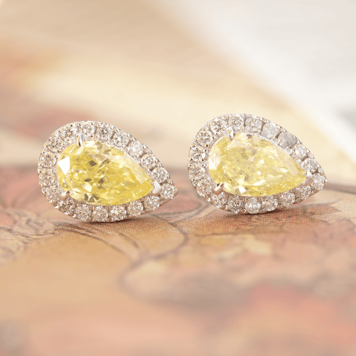 Platinum 1.5 ct tw Pear Shaped Fancy Yellow Lab Diamond Stud Earrings with Round Lab Diamond Halo - FIORESE JEWELRY