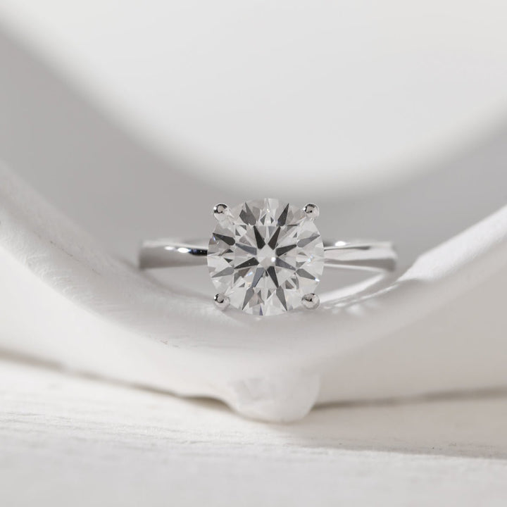 Platinum 3ct Round Lab Diamond 4 Round Prong Basket Solitaire Ring with Tapered Band Design - FIORESE JEWELRY