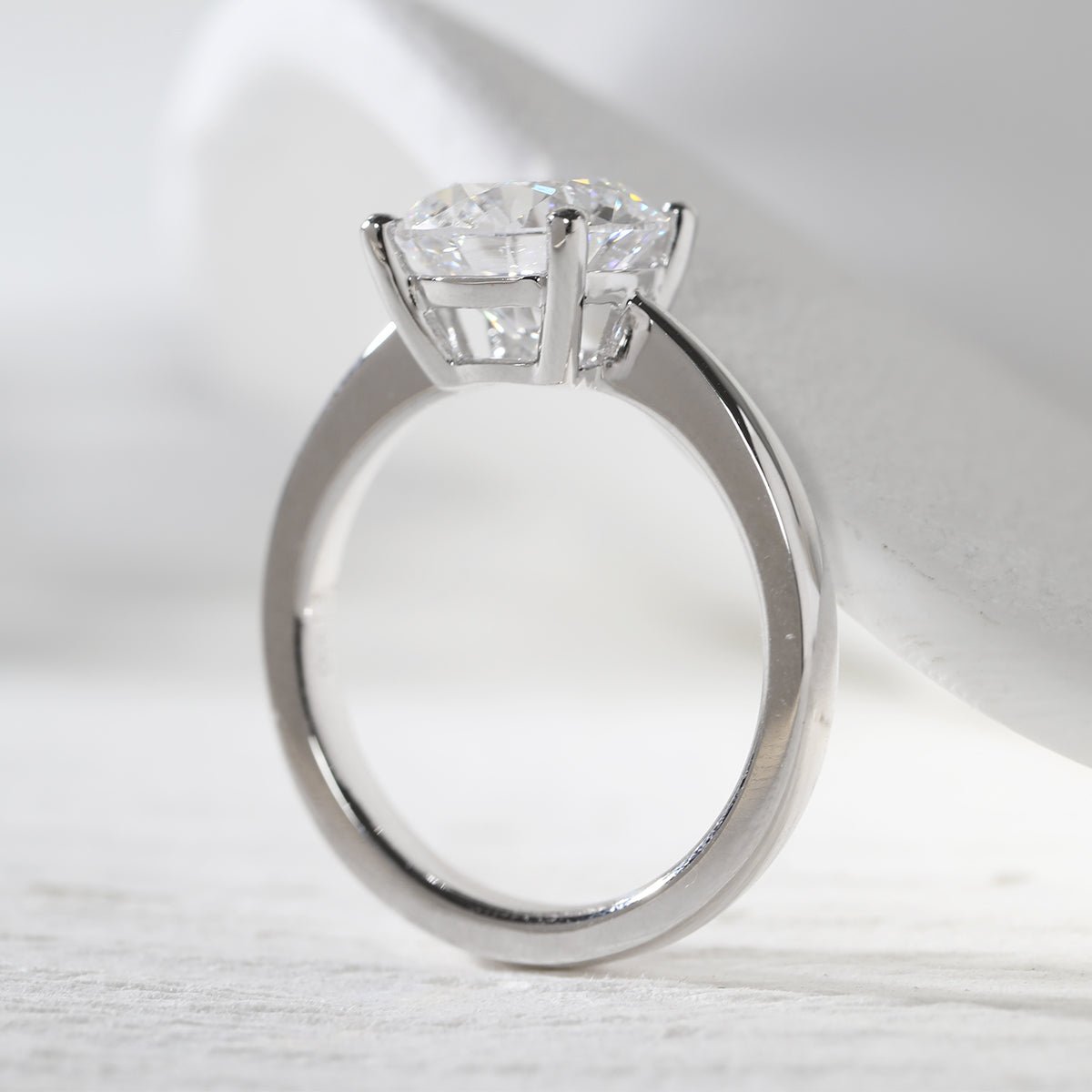 Platinum 3ct Round Lab Diamond 4 Round Prong Basket Solitaire Ring with Tapered Band Design