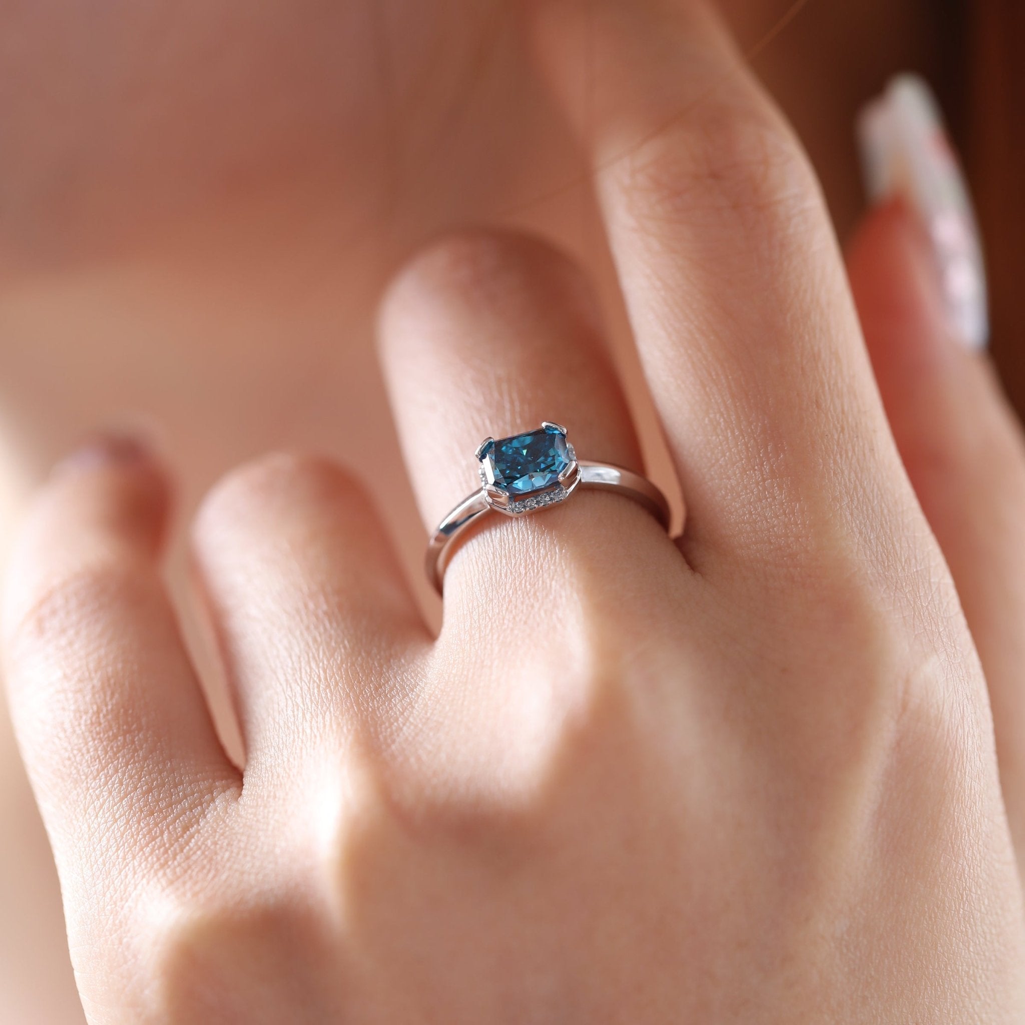Platinum Radiant Cut Blue Lab Diamond Starlit Ocean Oath Ring with Round Lab Diamond Half Hidden Halo