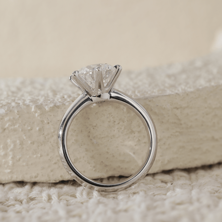 Round-Cut Diamond Solitaire Engagement Ring with Six-Claw Prongs and Knife-Edge Band - FIORESE JEWELRY