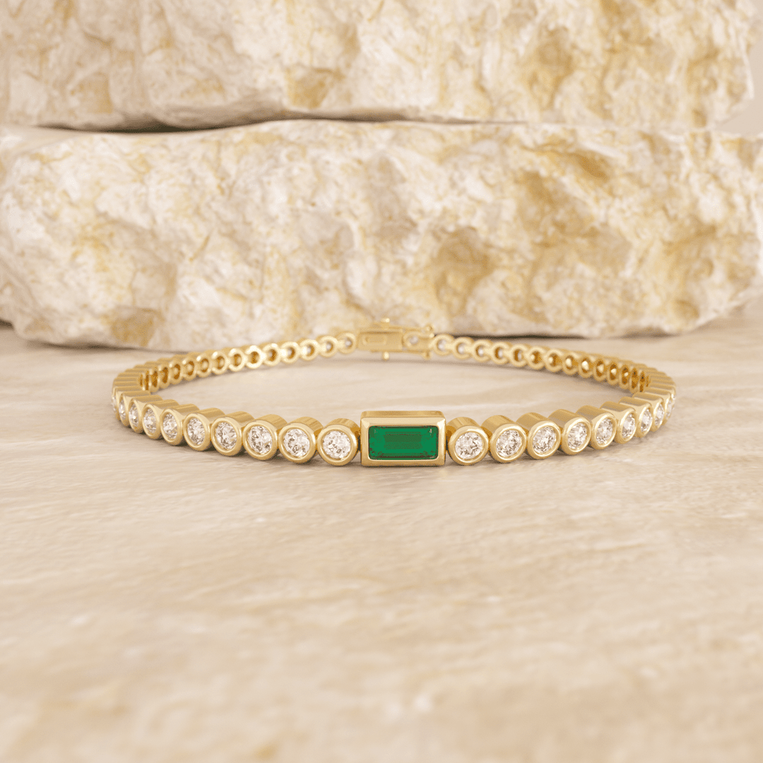 Round Lab Diamond Bezel - Set Tennis Bracelet with a Baguette Cut Lab Emerald Center Stone - FIORESE JEWELRY