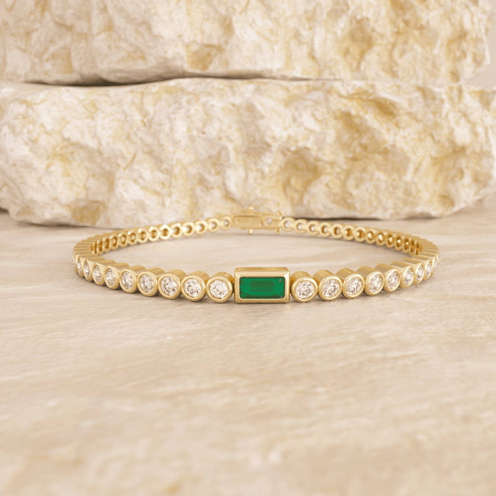 Round Lab Diamond Bezel - Set Tennis Bracelet with a Baguette Cut Lab Emerald Center Stone - FIORESE JEWELRY